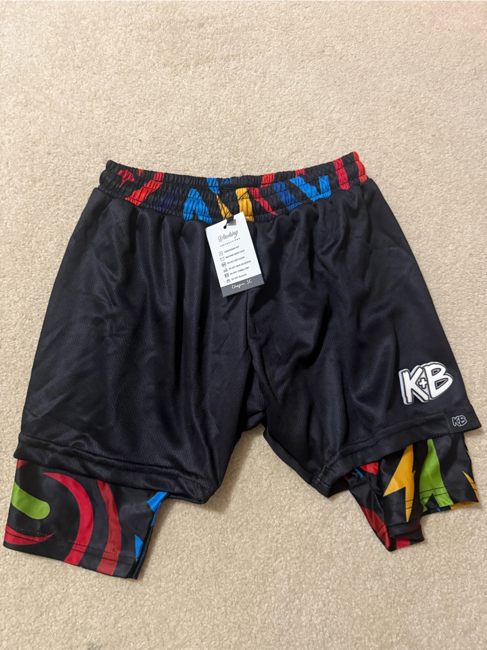Pinky Black Shorts with Red, Blue, Yellow & Green Trim